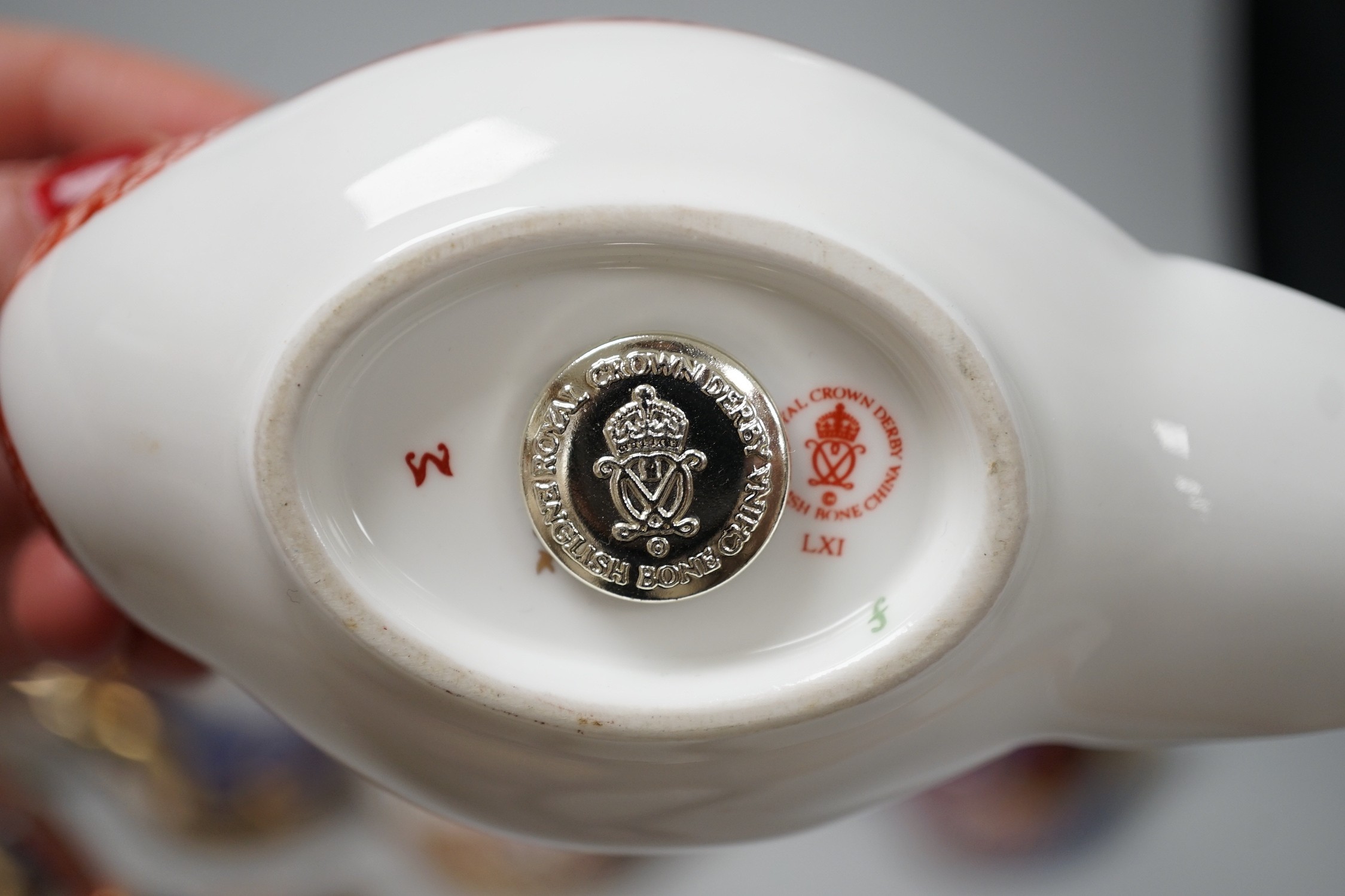 Twelve Royal Crown Derby ‘bird’ paperweights
